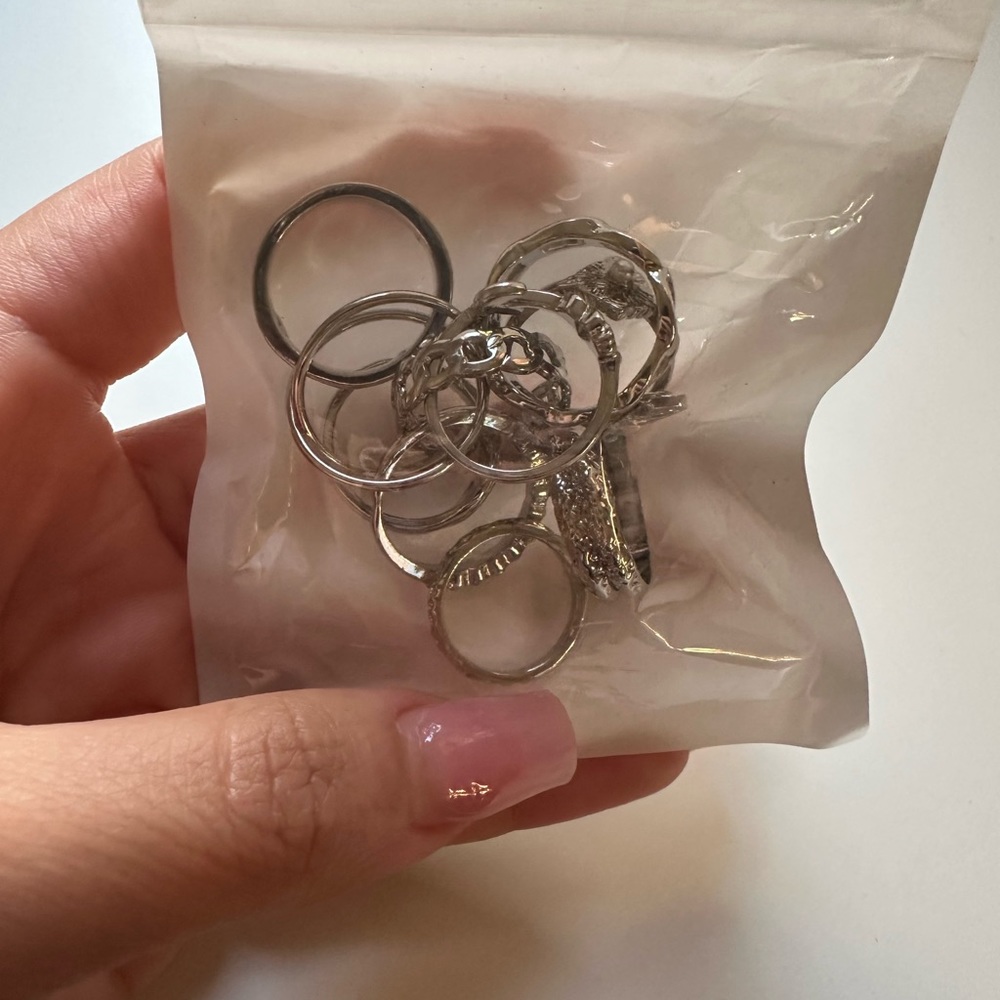 11 sliver rings with different designs
